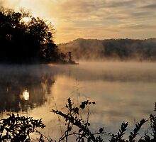 early morning fog over lake logan near hocking hills state park by 1busymom