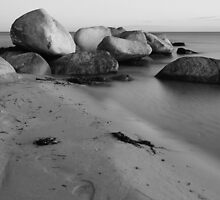 Stones in the sea by Falko Follert