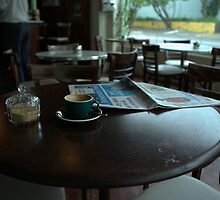 Coffee and Paper by Alfredo Estrella