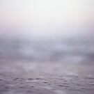 Coastal shoreline at low tide in pink grey purple semi abstract Mamiya 645 medium format film analog photo by edwardolive