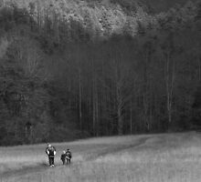hiking to the cabin by Christopher Ewing