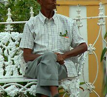 cuban man on bench by ashley reed