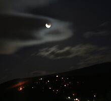 eclipse over the embers by Christopher Ewing