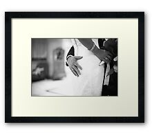Groom holding bottom of bride black and white wedding photograph Framed Print