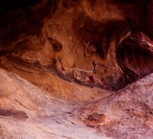 Petroglyphs and the Arch by Justin Mair