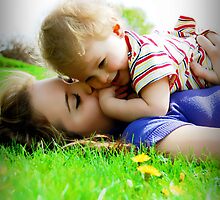 She Holds Her Sunshine Close To Her Heart by lisabella