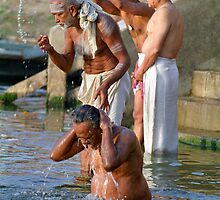 Ritual Bath in River Ganges, Varanasi, India by Petr Svarc
