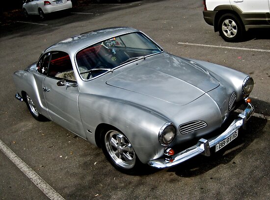 Silver Volkswagen Karmann Ghia photographed in the car park at the National