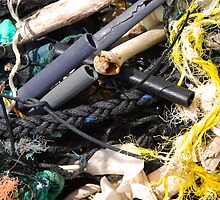 Medley of plastic beach flotsam in Hawaii by Michael Brewer
