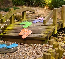 "Cross That Bridge When You Come To It" - flip flops over bridge by John Hartung