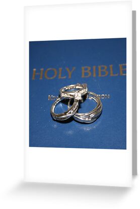 Wedding rings on The Holy Bible