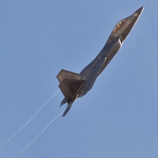 F-22 Raptor banking hard right on take off, creating vapor trails during Red Flag 10-2 at Nellis Air Force Base F-22 Raptor banking hard right on take off, creating vapor trails during Red Flag 10-2 at Nellis Air Force Base