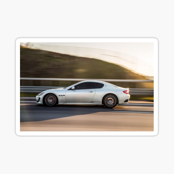 Masstering sports coupé in grey on the motorway Sticker