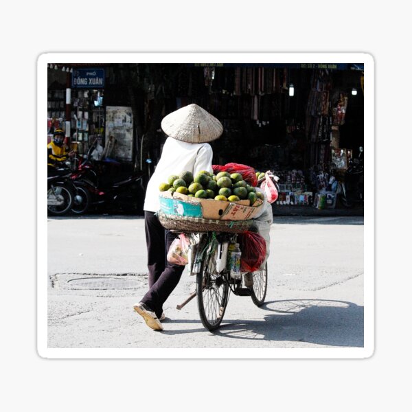 Vietnamese woman street vendor with conical hat, Hanoi Sticker