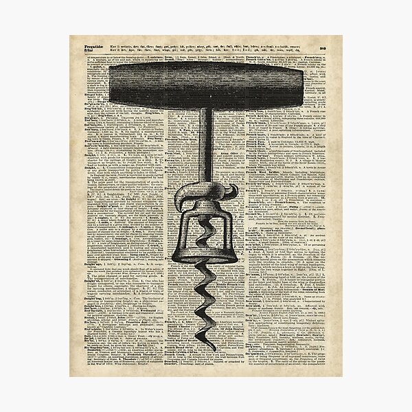 Vintage Corkscrew Over Old Encyclopedia Page Photographic Print