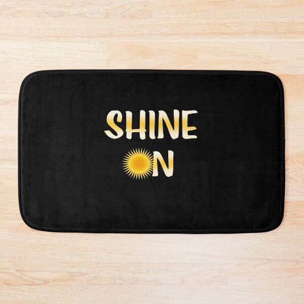 Item preview, Text in yellow that says "Shine On" with a sun for the o in on. designed and sold by With My Hands By K.