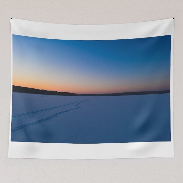 Item preview, Frozen ice  lake in winter under the snowy covered under a blue sky at dawn designed and sold by yarvin13.