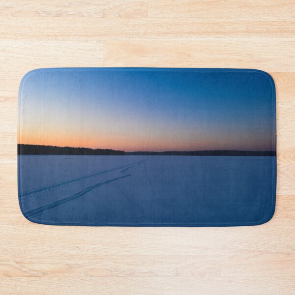 Item preview, Frozen ice  lake in winter under the snowy covered under a blue sky at dawn designed and sold by yarvin13.