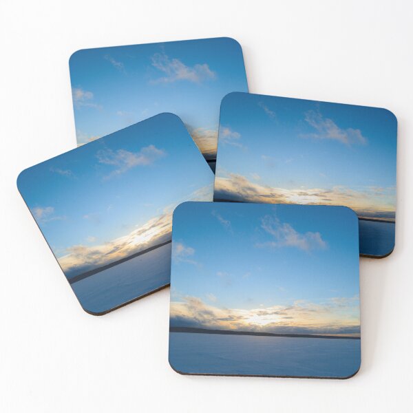 Item preview, Sunset  on  blue sky over a snowy frozen lake winter on  the horizon over the ice designed and sold by yarvin13.