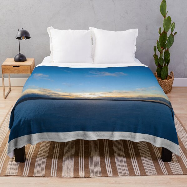 Item preview, Sunset  on  blue sky over a snowy frozen lake winter on  the horizon over the ice designed and sold by yarvin13.