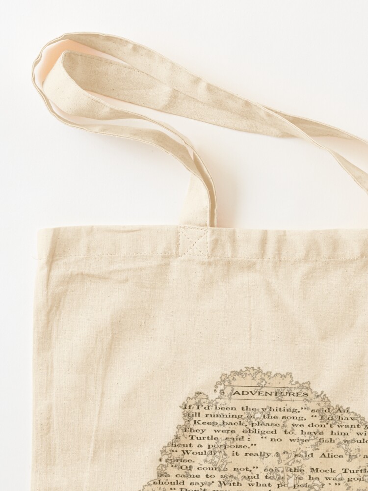 Alice in Wonderland on antique book page Tote Bag