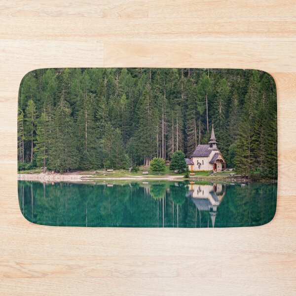 Item preview, Chapel and trees are reflected in the water of Lake Braies in the Pusteria valley, Italy designed and sold by brambillasimone.