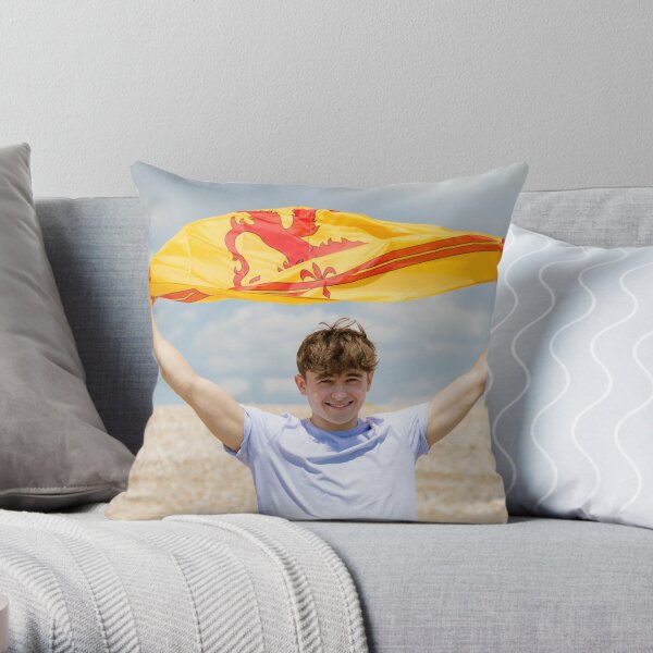 A young man with a Lion Rampant of Scotland flag Throw Pillow