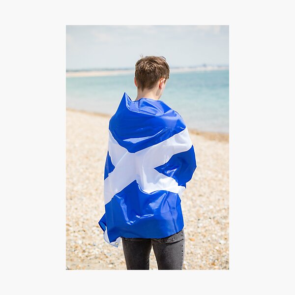 Item preview, A young man holding the flag of Scotland designed and sold by Ben Gingell.