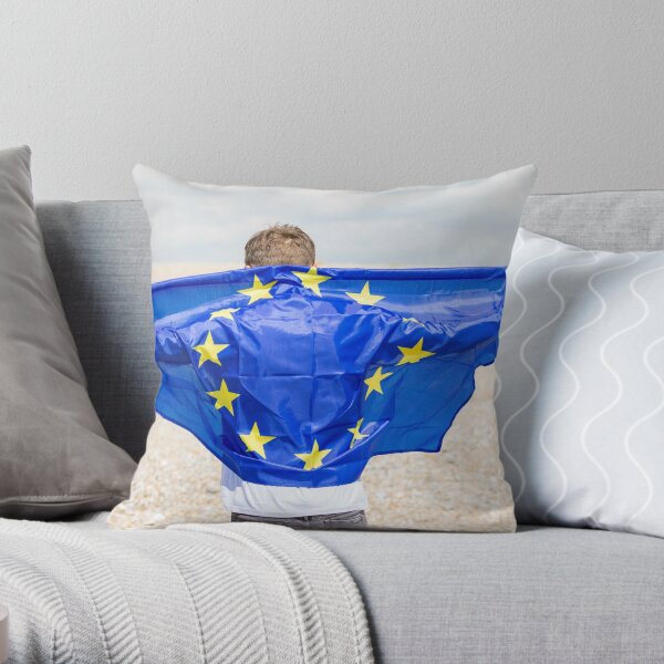 A young man holding the flag of The European Union Throw Pillow