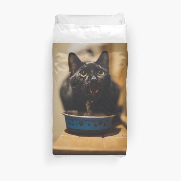 cute black cat feeding, Duvet Cover