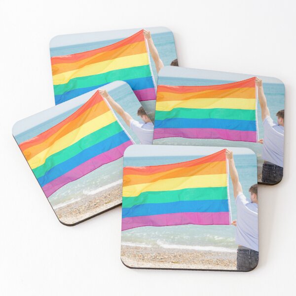 Item preview, A young man holding a Pride flag designed and sold by Ben Gingell.