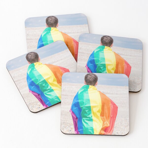 Item preview, A young man holding a Pride flag designed and sold by Ben Gingell.