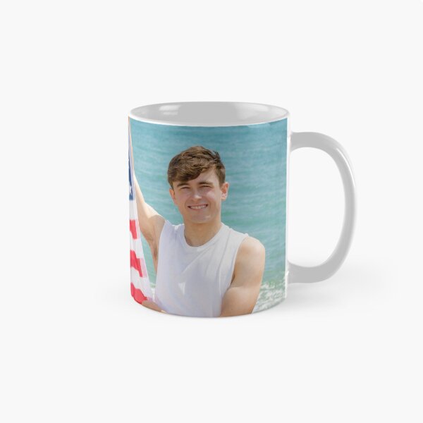 Item preview, A young man holding the flag of The USA designed and sold by Ben Gingell.