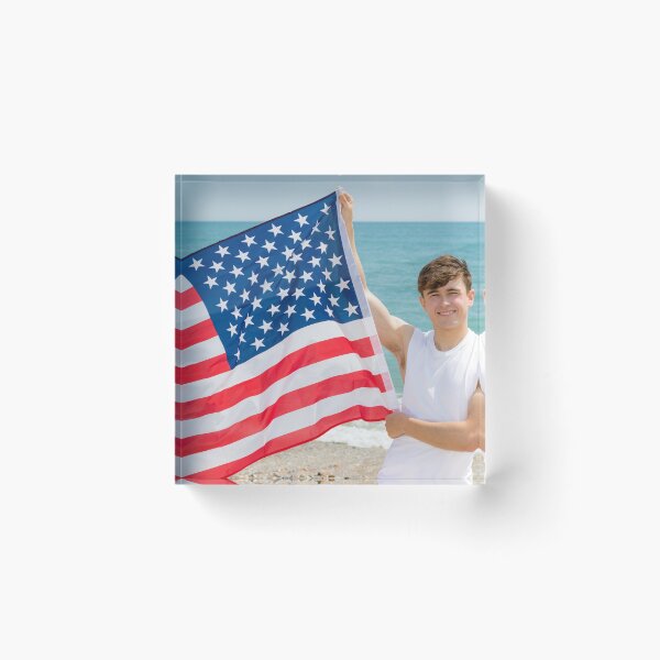 Item preview, A young man holding the flag of The USA designed and sold by Ben Gingell.