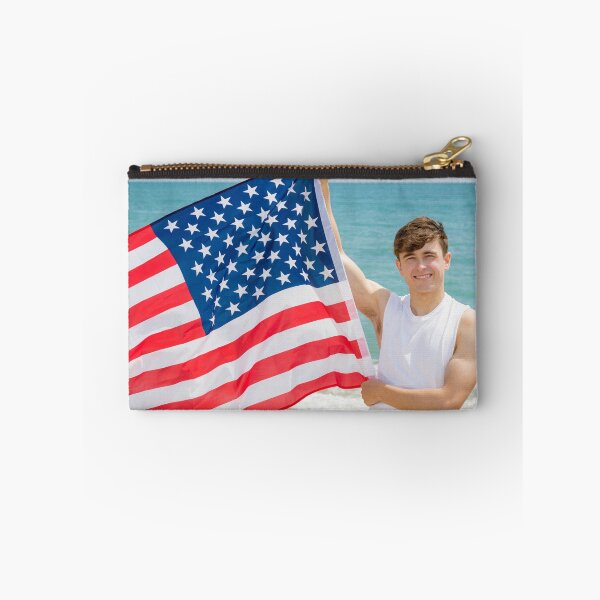 Item preview, A young man holding the flag of The USA designed and sold by Ben Gingell.