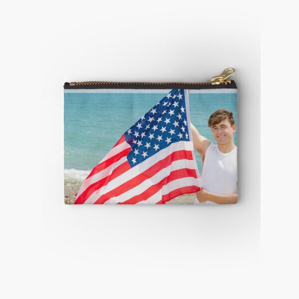 Item preview, A young man holding the flag of The USA designed and sold by Ben Gingell.