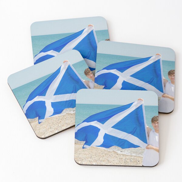 Item preview, A young man holding the flag of Scotland designed and sold by Ben Gingell.