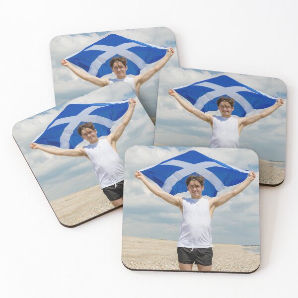 Item preview, A young man holding the flag of Scotland designed and sold by Ben Gingell.