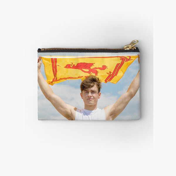 Item preview, A young man holding the Lion Rampant flag of Scotland designed and sold by Ben Gingell.
