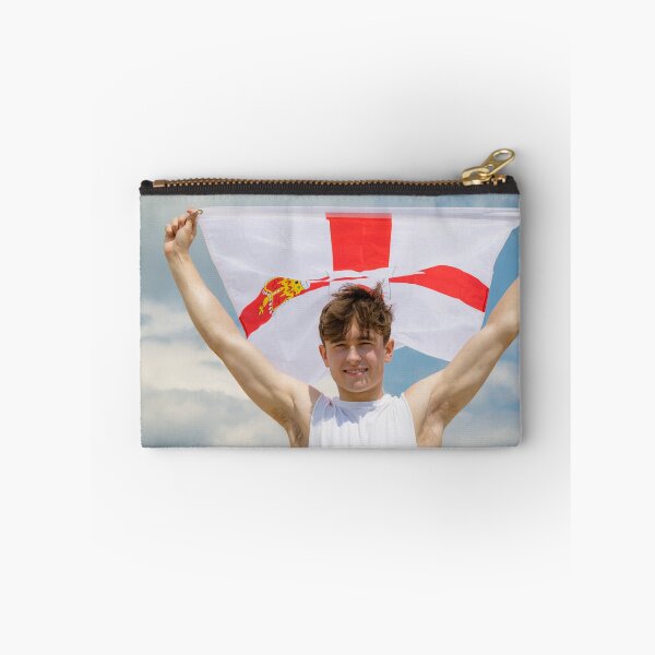 Item preview, A young man holding the flag of Northern Ireland designed and sold by Ben Gingell.