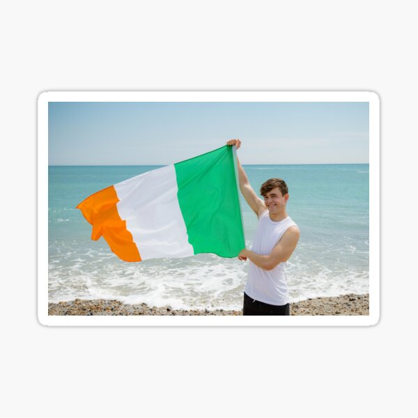 A young man holding the Irish Flag Sticker