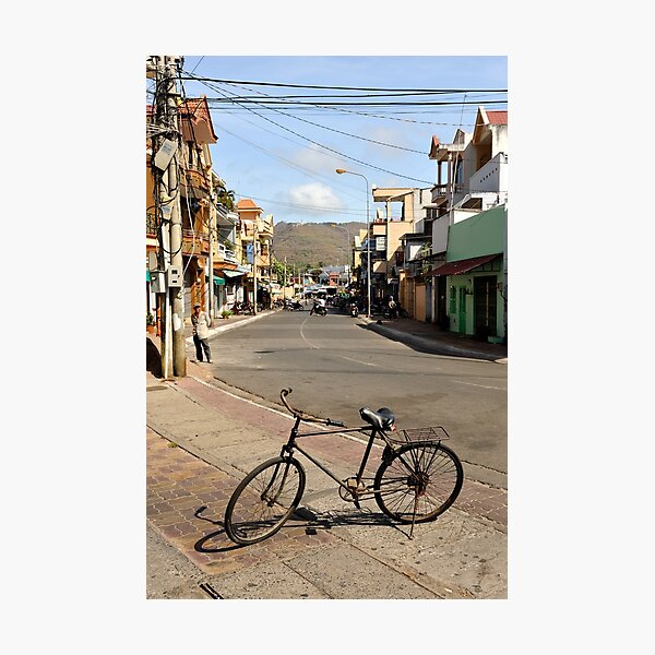Old bicycle on footpath, Vung Tau, Vietnam Photographic Print