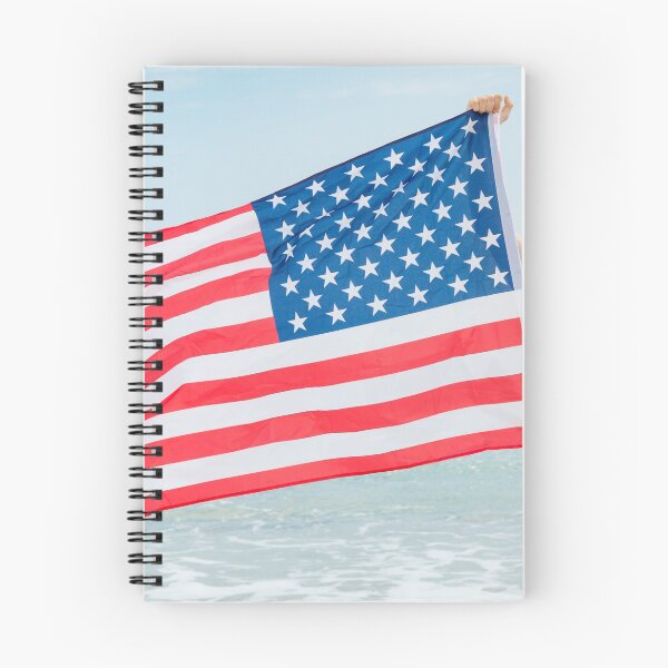 Item preview, A shirtless young man holding the American flag designed and sold by Ben Gingell.