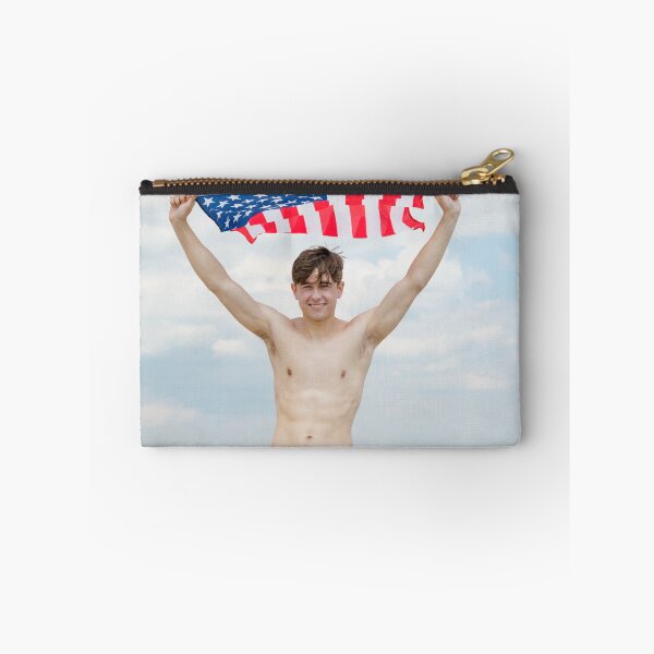 Item preview, A shirtless young man holding the American flag designed and sold by Ben Gingell.