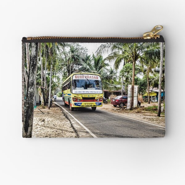 Colourful bus in rural Indian village in Coastal India Zipper Pouch