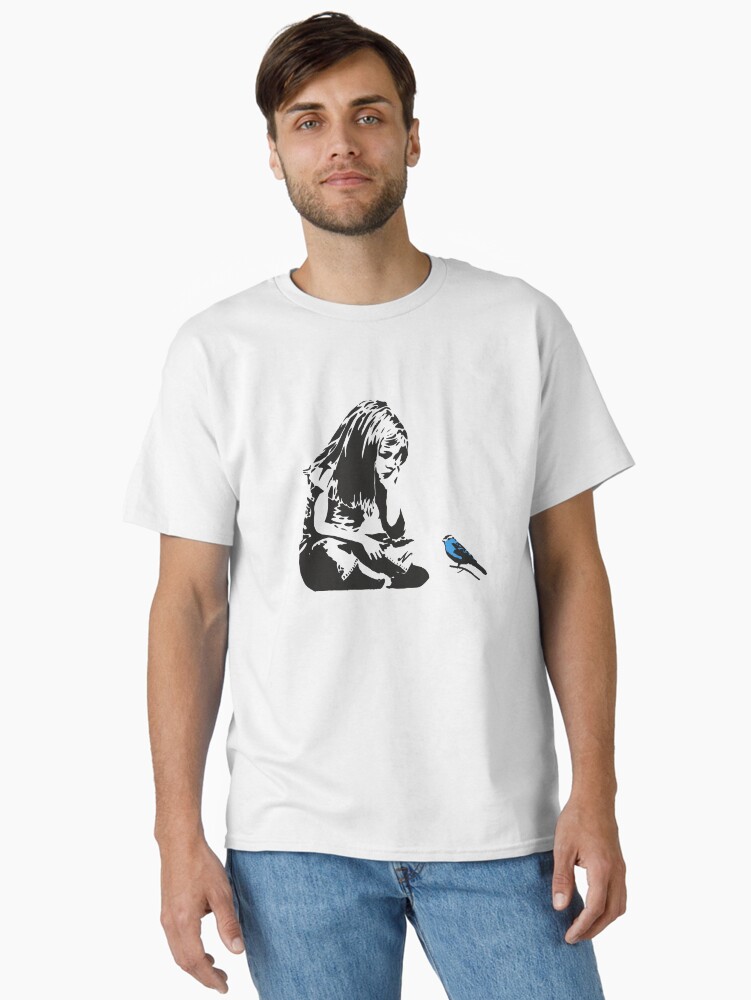 Thumbnail 1 of 7, Classic T-Shirt, Girl with Blue Bird - Banksy Graffiti - Hull city centre designed and sold by portokalis.