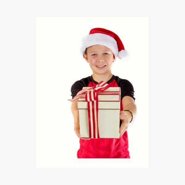 Pre-teen boy with a christmas gift Art Print