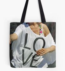 It Makes The World Go 'Round! Tote Bag