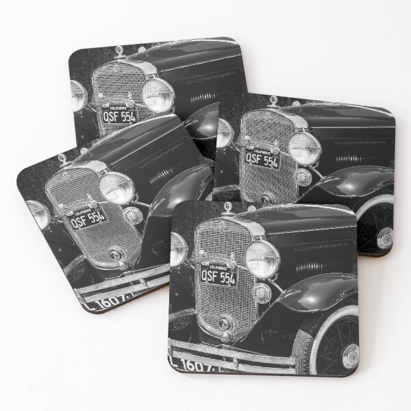 Item preview, A black and white image of the front of a 1931 Chevrolet sedan on display at a car show designed and sold by Graham Cornall.