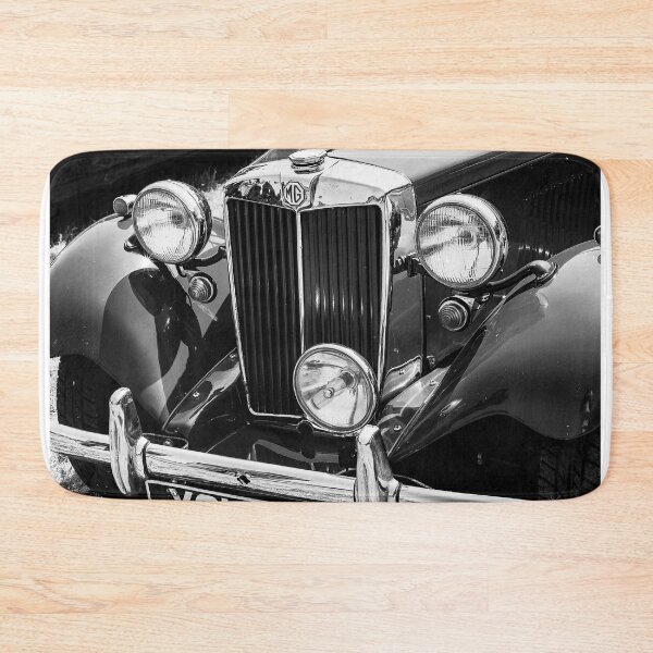 Item preview, A black and white image of the front of a MG TA on display at a car show designed and sold by Graham Cornall.
